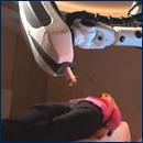 Photo of Woman receiving Cyberknife treatment